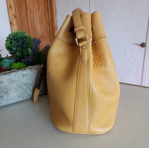 Dooney & Bourke Vintage, Teton Drawstring Bag in solid Palomino Yellow - Picture 5 of 12